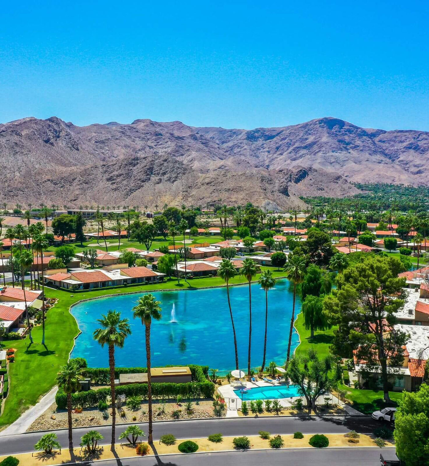 coachella valley mountains with snow from golf course